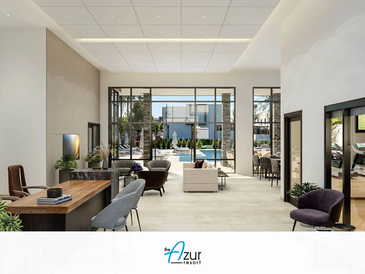 The Azur Resort clubhouse exterior with community logo