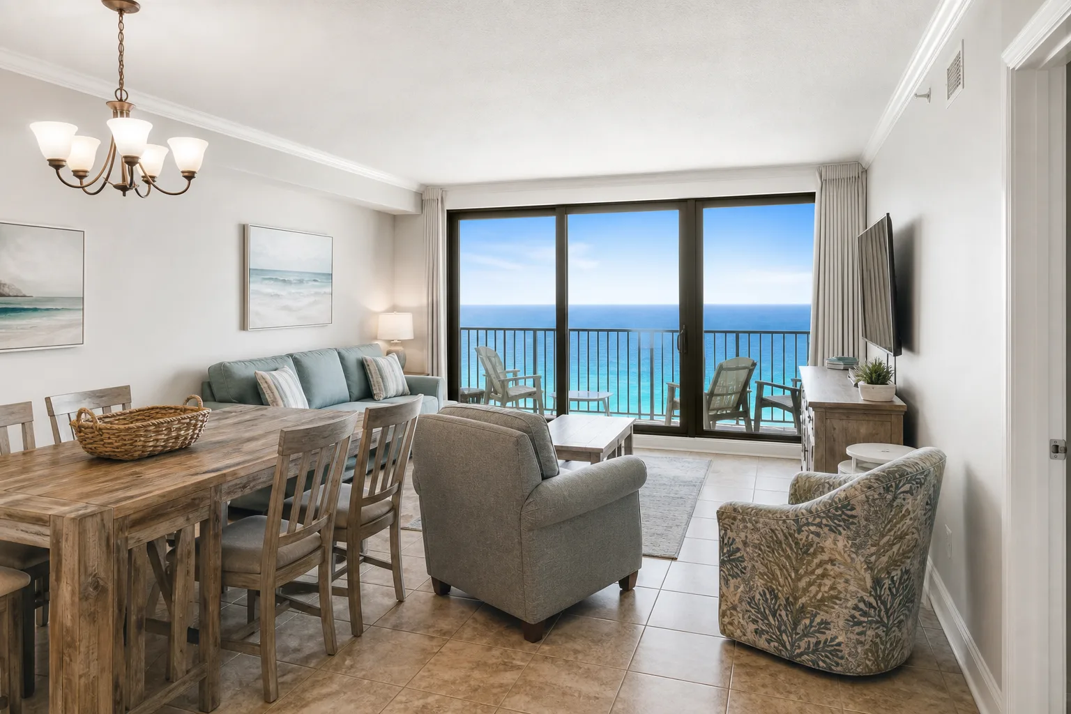 Gulf-front condo living and dining room furnished for Panama City Beach, Florida STR