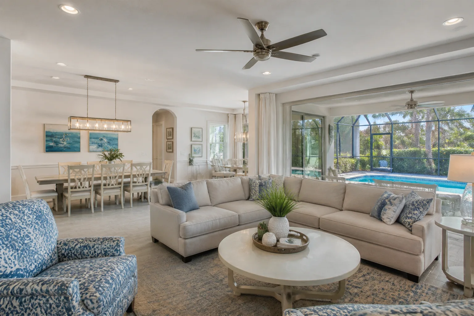 Open-concept living and dining room furnished for a Sarasota, Florida vacation rental