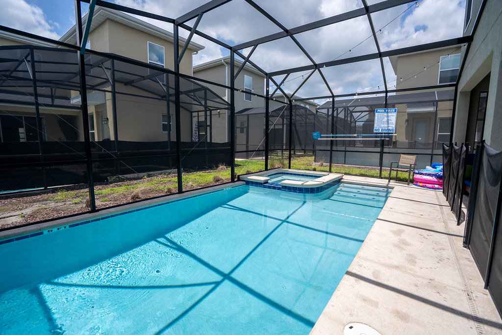 Empty pool deck ready for outdoor furniture package