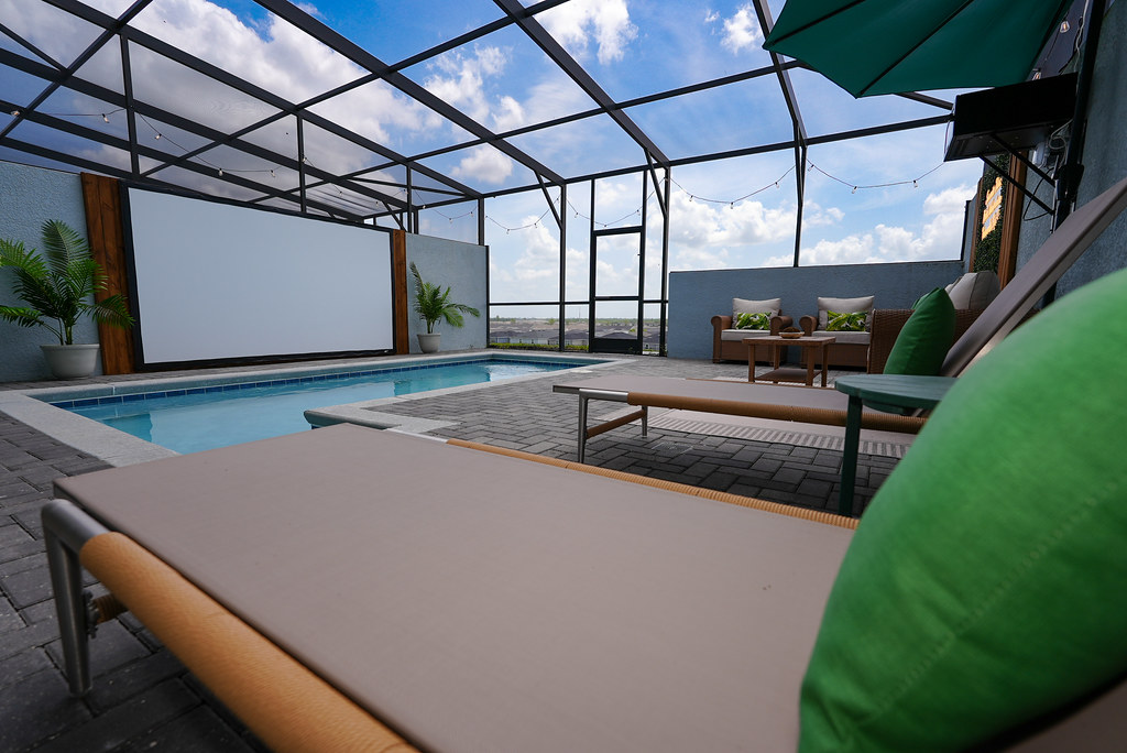 Outdoor pool deck portfolio preview - completed outdoor theater and lanai design