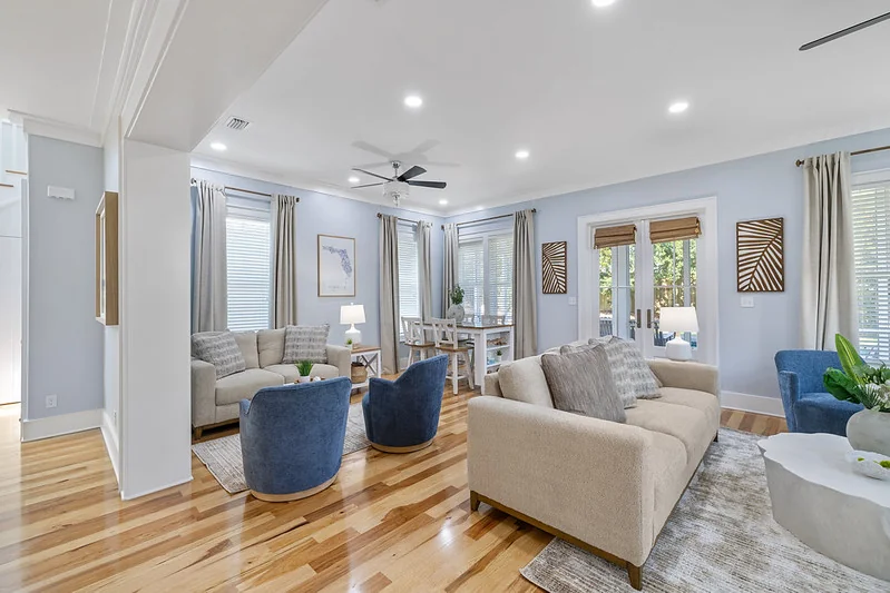 Vacation rental kitchen and living space after turnkey furnish and houseware setup