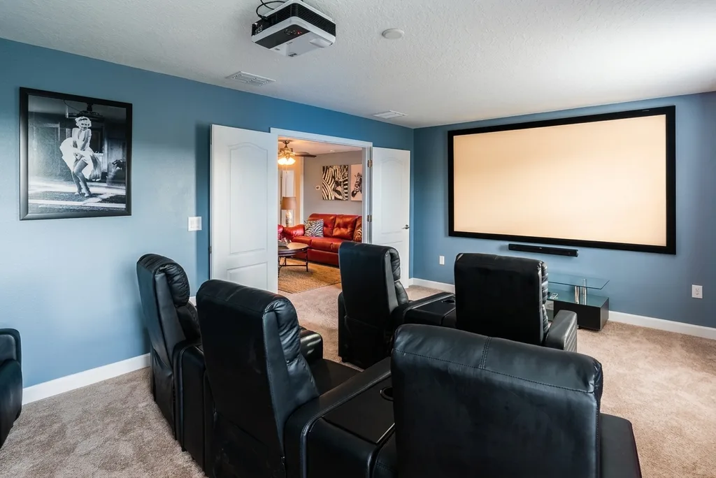 Theater room furnished by Furniture Packages USA at 1453 Belle Terre Road