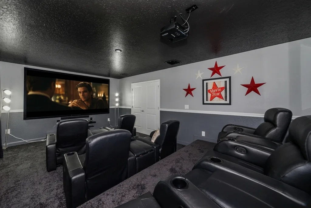 Theater room furnished by Furniture Packages USA at 1566 Observer Lane