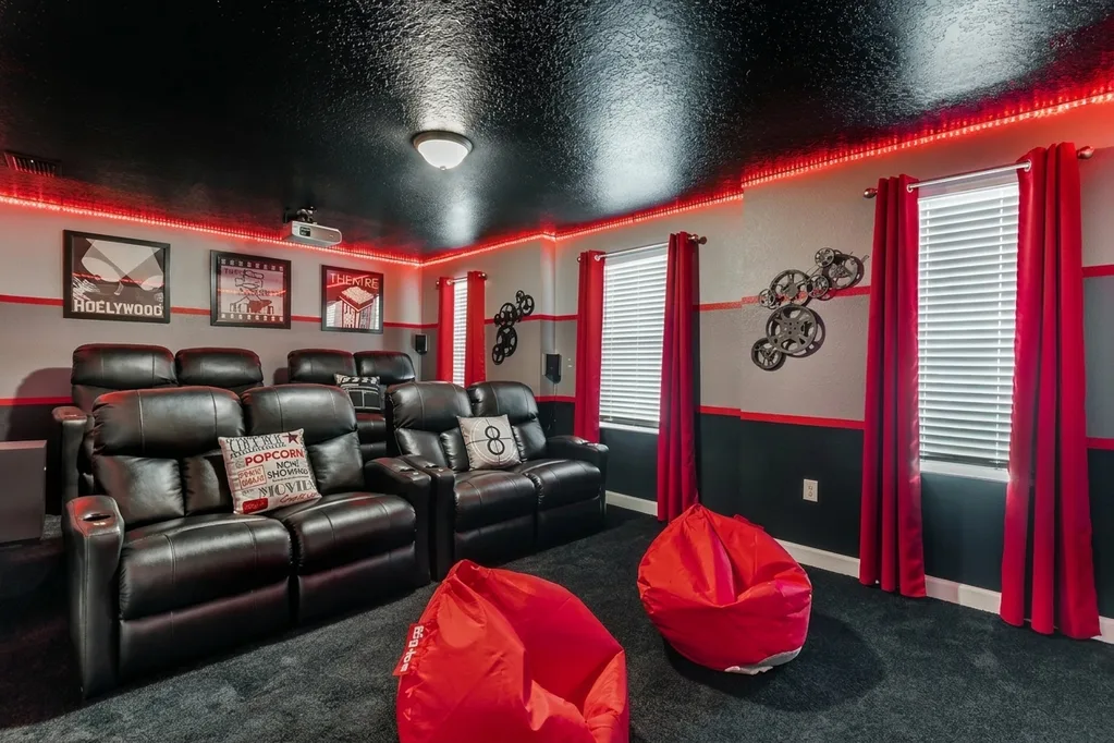 Theater room furnished by Furniture Packages USA at 2834 Storey Cove Ave