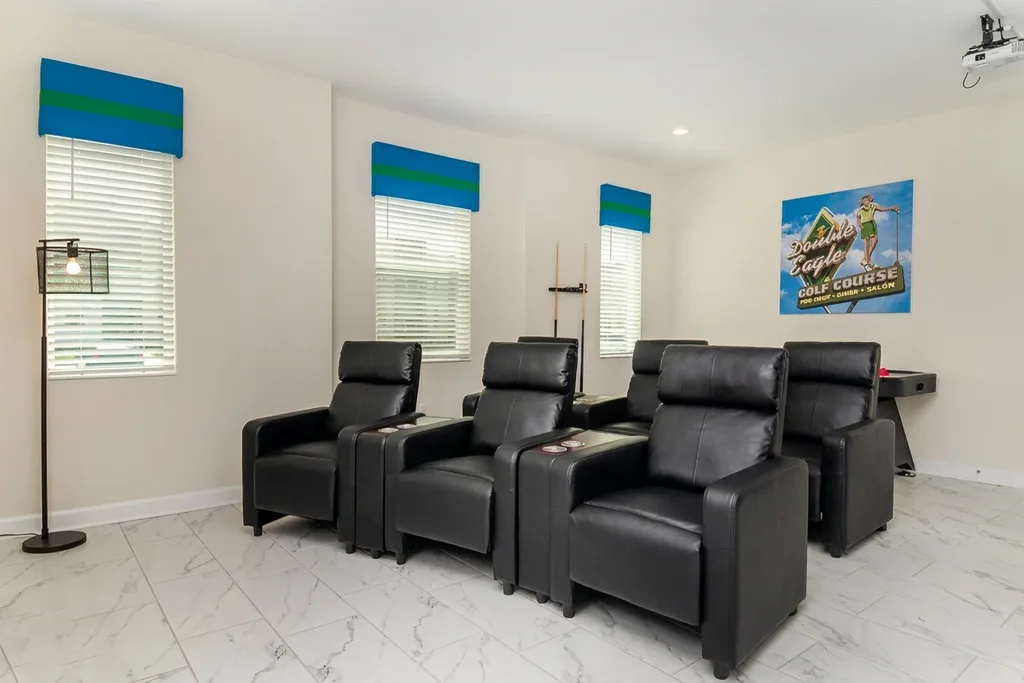 Theater room furnished by Furniture Packages USA at 4555 Narrative Lane
