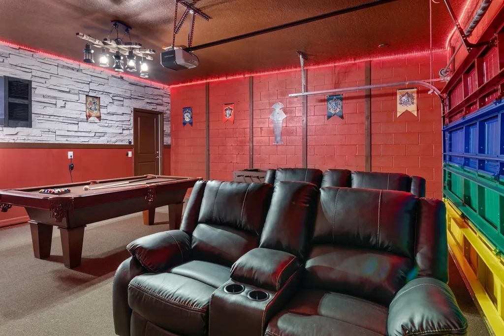 Theater room furnished by Furniture Packages USA at 7372 Oakmoss Loop