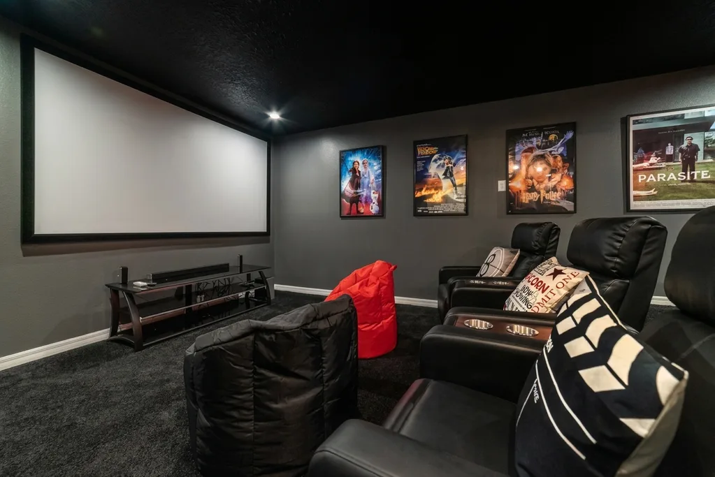 Theater room furnished by Furniture Packages USA at 8951 Hilton Ridge