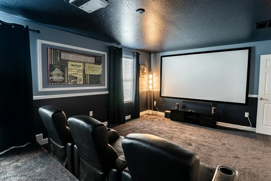 Theater room furnished by Furniture Packages USA at 9153 Wedge Drive